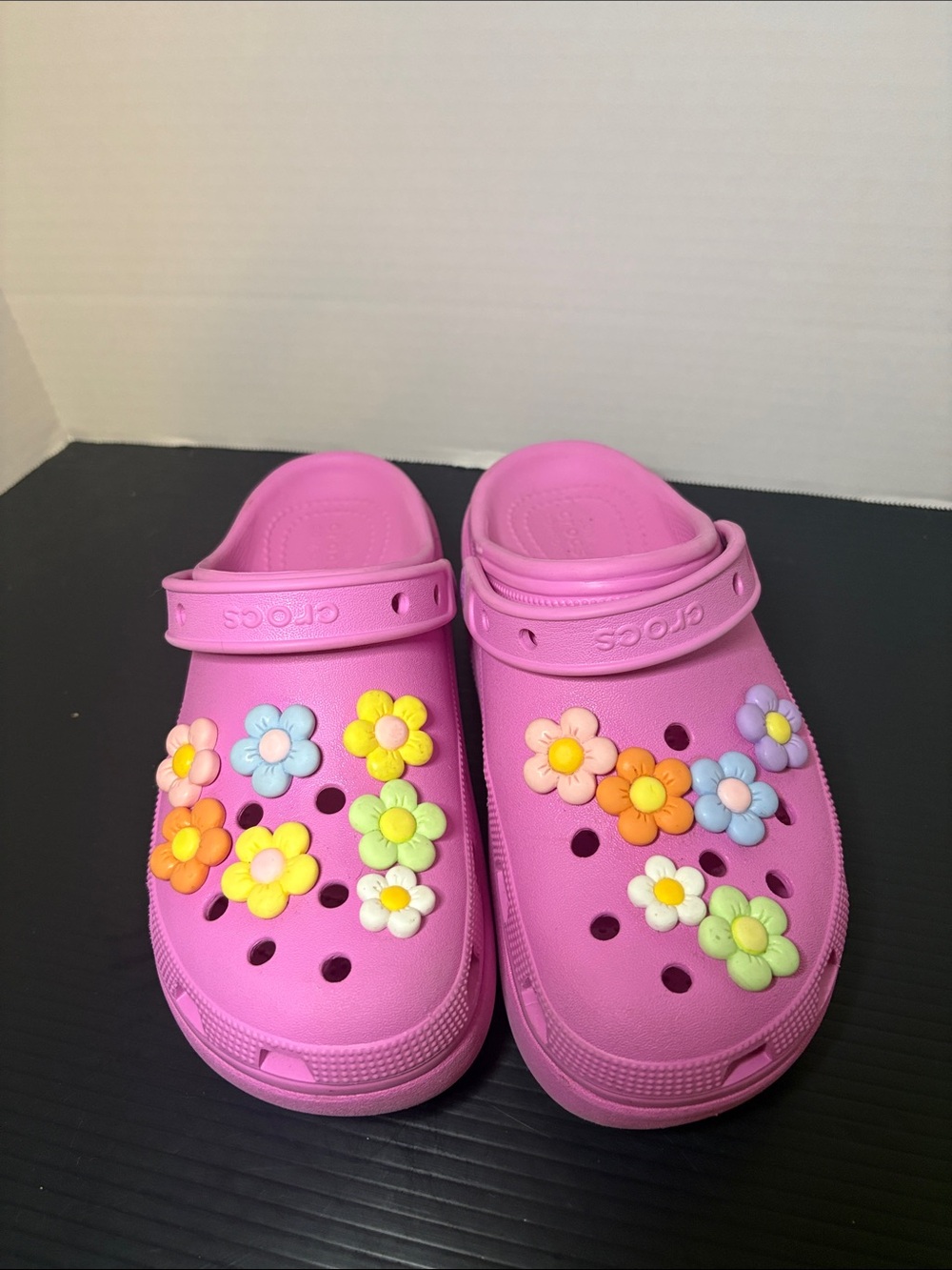 CROCS Kids Pink platform Clogs with Multicolor Flower Charms
